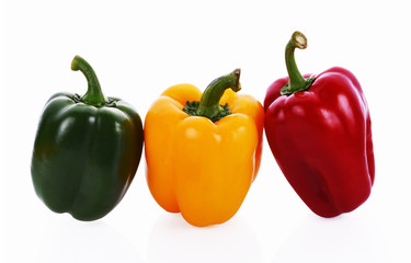 Sweet pepper red yellow and green on white background