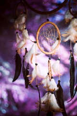 Dreamcatcher against a background of purple sunset dark