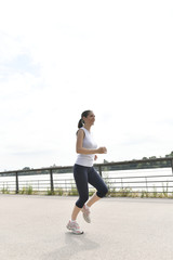 Running woman in the city