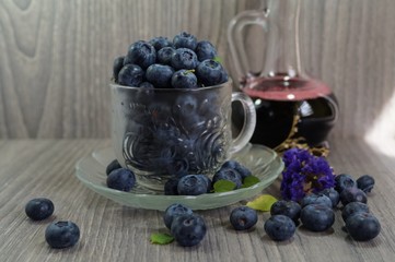 Freshly picked blueberries a glass a cup
 . Juicy and fresh blueberries - Blueberry antioxidant. - Concept for healthy eating and nutrition
