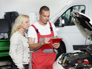 Female customer and mechanic