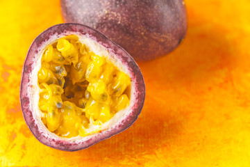 Passion fruit on the orange background horizontal