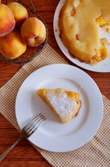 Peach caramel turnover pie sprinkled with sugar powder