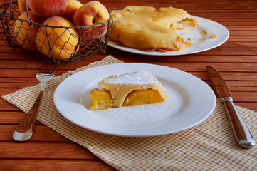 Peach caramel turnover pie sprinkled with sugar powder