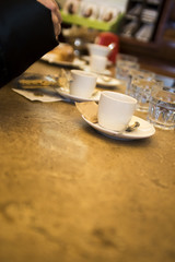 Obraz na płótnie Canvas serve coffee at the bar
