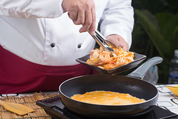 Chef cooking Pad Thai