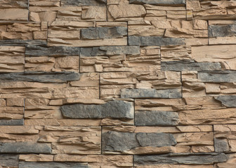 background wall of stone blocks