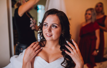 Bride and bridesmaids during the wedding preparations