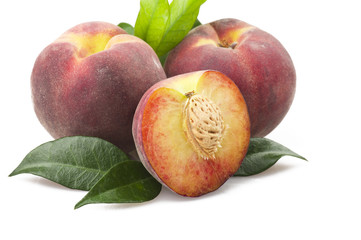 Fresh peach sliced close up on the table