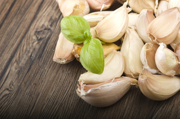 Group of garlic cloves on the wood