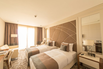 Fototapeta na wymiar Modern hotel room with big bed
