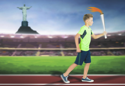Young athlete boy with sport torch bearer running