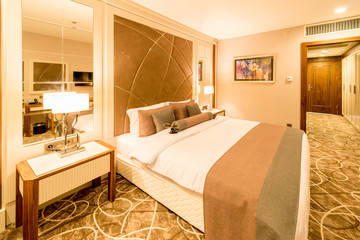Modern hotel room with big bed