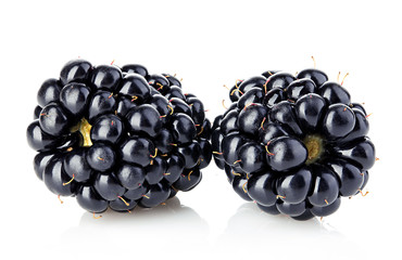 Fresh blackberries close-up isolated on a white background.