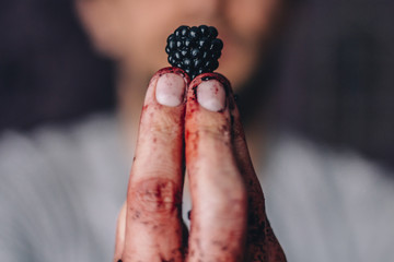 Man's hand holding a blackberry - 117186223