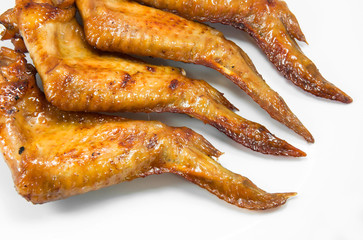 Grilled chicken wings  on white background