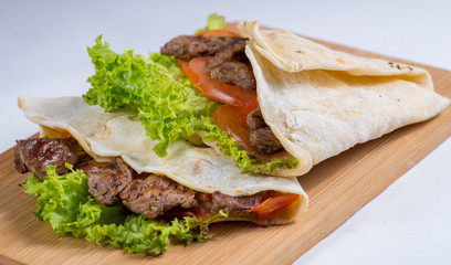 snack with meat and vegetables in a pita