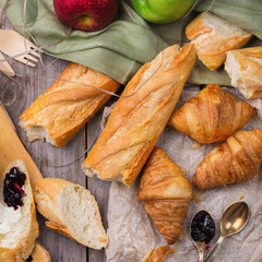 French baguette with butter and jam for breakfast