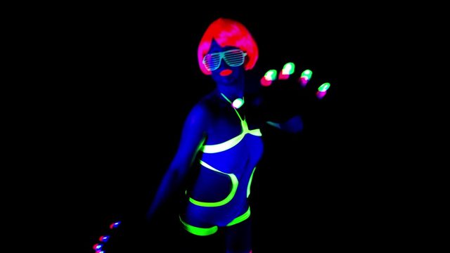 disco gogo dancer in glow UV costume