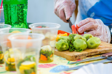 Chef preparing salad. Preparation mojito