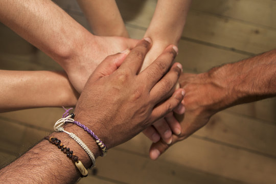 Group of hands holding together