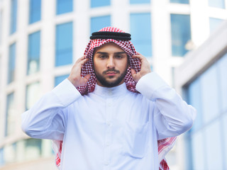Outdoors portrait of a handsome arabian man