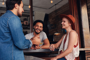 Young people hanging out at a cafe