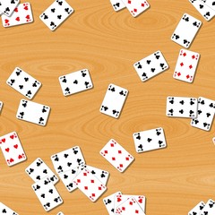 playing cards scattered on the wooden table seamless background