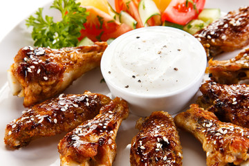 Grilled chicken wings and vegetables 