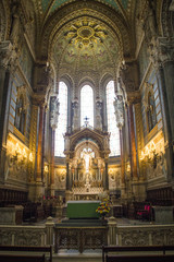 Various statues inside the Basilica of Notre Dame de Fourvière in Lyon, France
