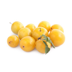 Small yellow plums isolated