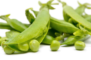 Pods of green peas isolated on a white background. Green, ripe, fresh vegetables. Legumes.