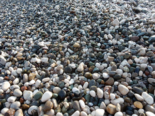 wet sea pebbles background