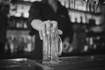 Barman at work in the pub