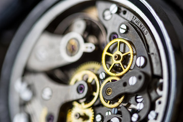 Vintage watch, close-up of wheels and cogs.