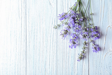 Lavender flowers on wooden background