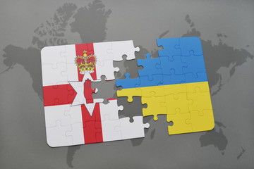 puzzle with the national flag of northern ireland and ukraine on a world map background.
