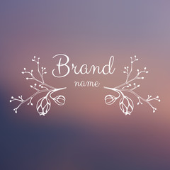 Vector botanical logo,label,emblem on the blurred background. Floral shop or natural organic cosmetics design