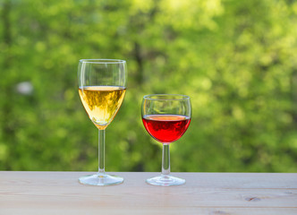 two wine glasses on table