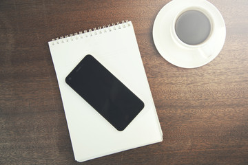 coffee,notepad and phone