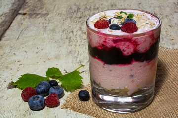 fruit yogurt with berries in a glass
