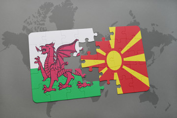 puzzle with the national flag of wales and macedonia on a world map background.