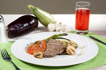 Argentine cut of meat bathed in traditional sauce served with ve