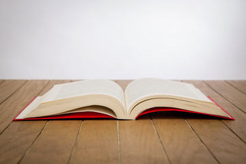colorful books on wooden table