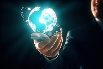 Man holding smartphone with globe