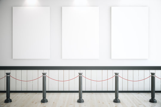 Three blank posters in museum