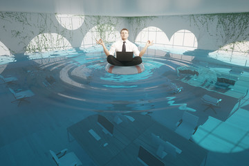 Businessman meditating in flooded office