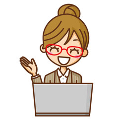 眼鏡のビジネスウーマンとPC