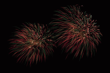 zoom in fireworks show on black background