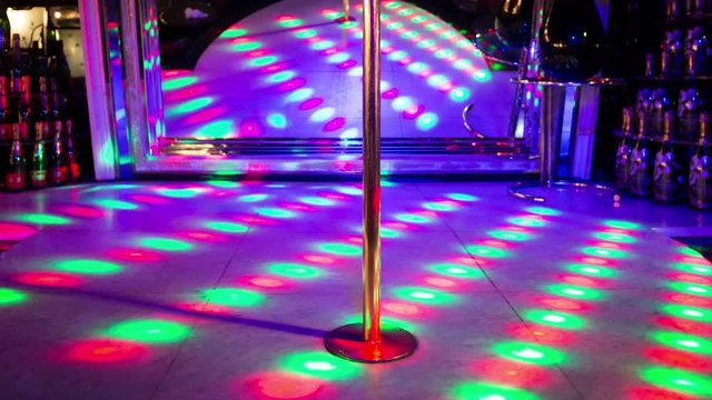 lights on the stage of strip club